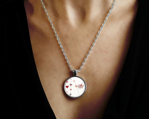 Collier cabochon, collier oiseau illustré, "l'oiseau", argentéé  (ref.